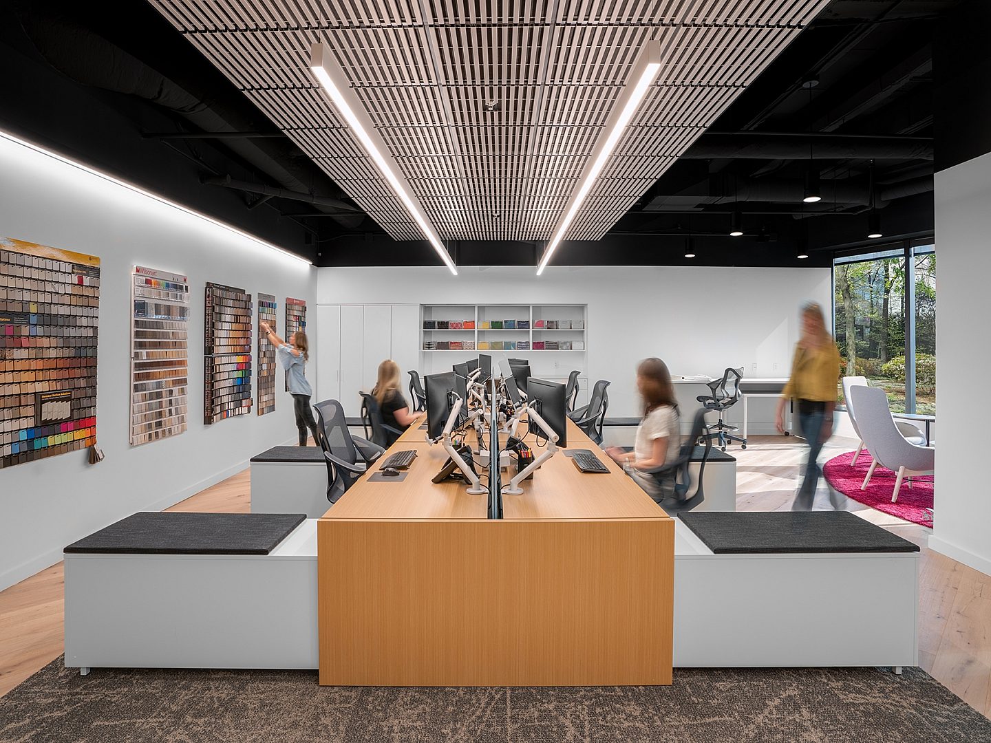 A modern office space with open floor plan desks