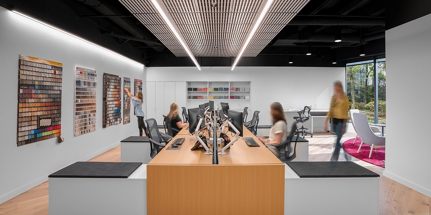 A modern office space with open floor plan desks